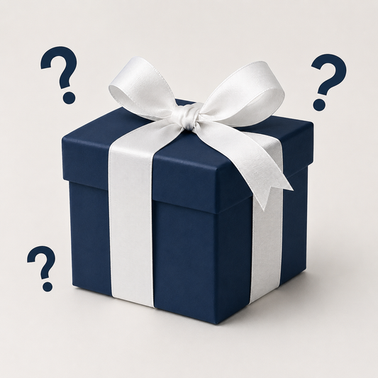 Mystery gift - navy box with white ribbon